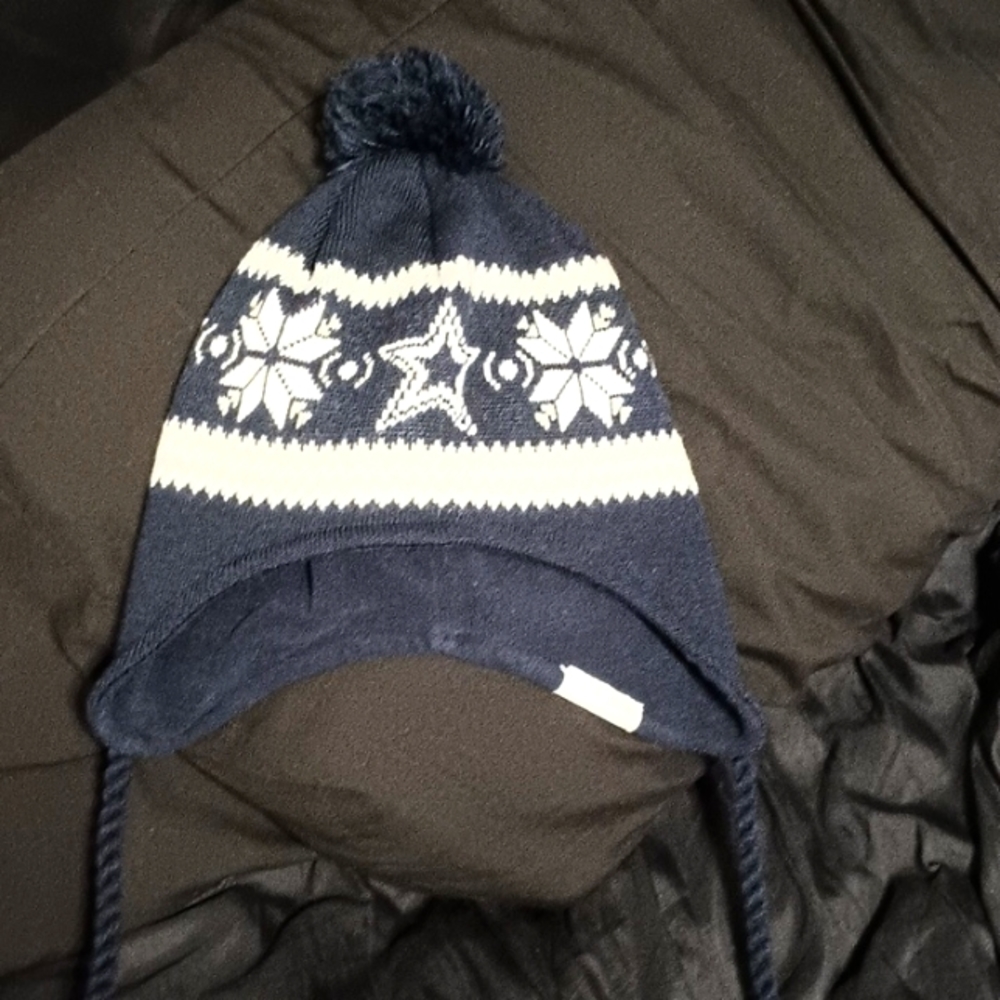Official NFL Dallas Cowboys beanie with ear flaps. Navy blue. OSFM. Like new